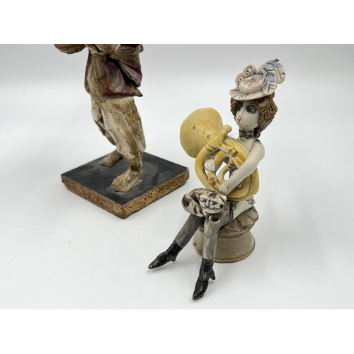 302 - Two figurines, one studio pottery signed B to base and one papier-mâché