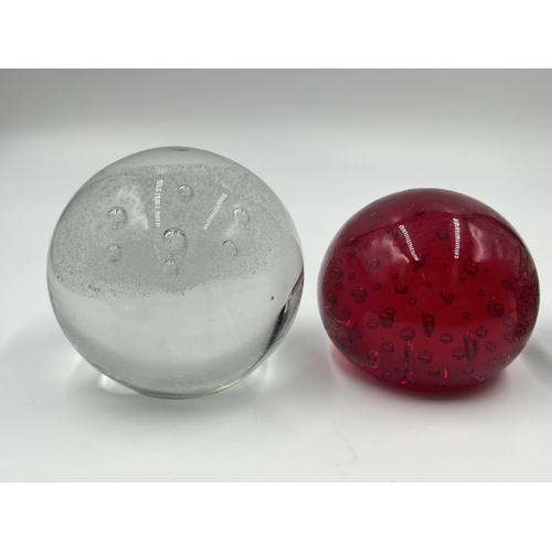 304 - Seven studio glass paperweights to include Caithness Spinaway, Rosenthal, Millefiori etc.