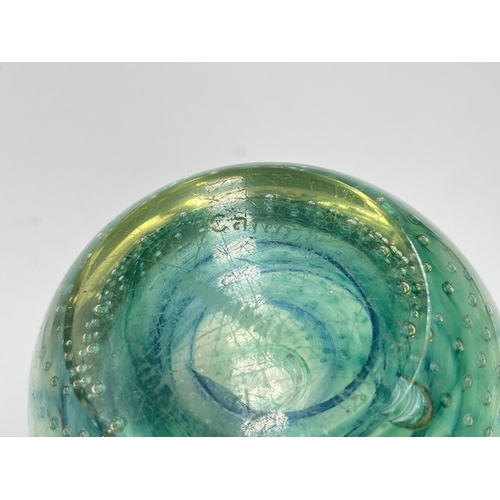 304 - Seven studio glass paperweights to include Caithness Spinaway, Rosenthal, Millefiori etc.