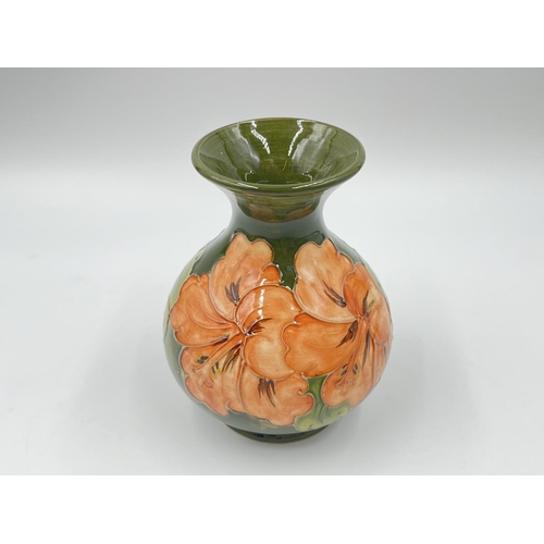 314 - A Moorcroft Coral Hibiscus vase - approx. 13cm high