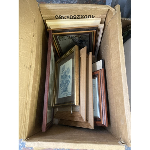 911 - Six boxes containing a large quantity of pictures to include watercolour depicting fishing boats at ... 