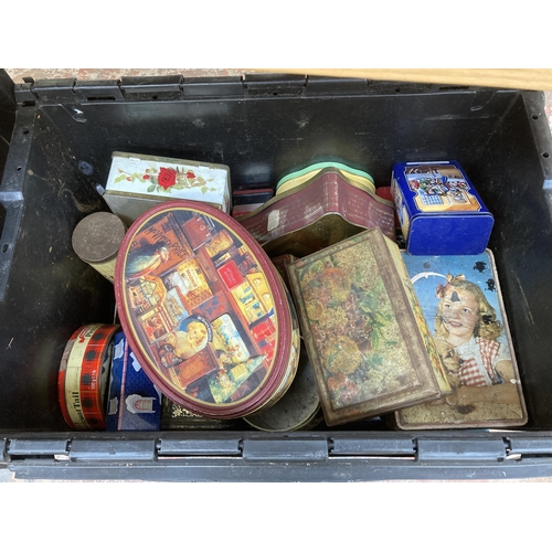 917 - Two large boxes containing a quantity of collectible tins