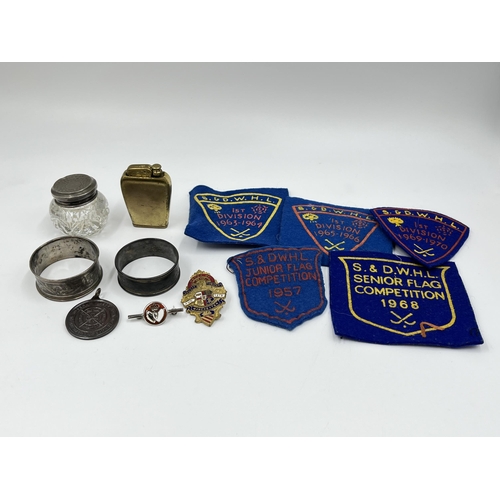 2369 - A collection of vintage ephemera to include two sterling silver napkin rings, Edwardian Boots Pure D... 