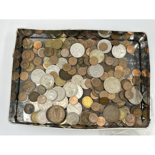 2373 - A collection of world coins to include .925 silver 1866 shilling, .900 silver 'Seated Liberty' ¼ Dol... 