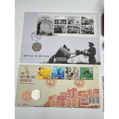 2375 - A collection of 50p coins and first day covers to include to include Royal Mint The 75th Anniversary... 