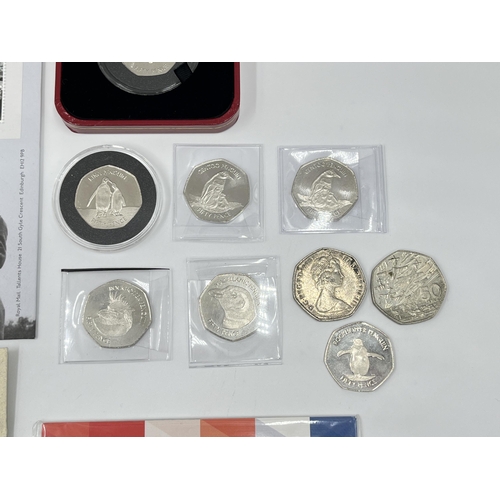 2375 - A collection of 50p coins and first day covers to include to include Royal Mint The 75th Anniversary... 