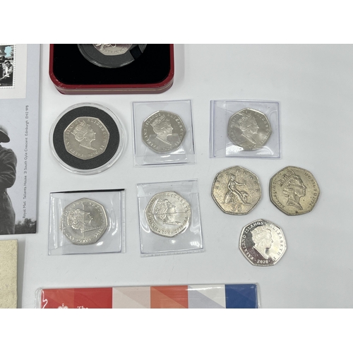 2375 - A collection of 50p coins and first day covers to include to include Royal Mint The 75th Anniversary... 