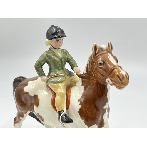 245 - A Beswick girl on pony figurine, model no. 1499 - approx. 14.5cm high