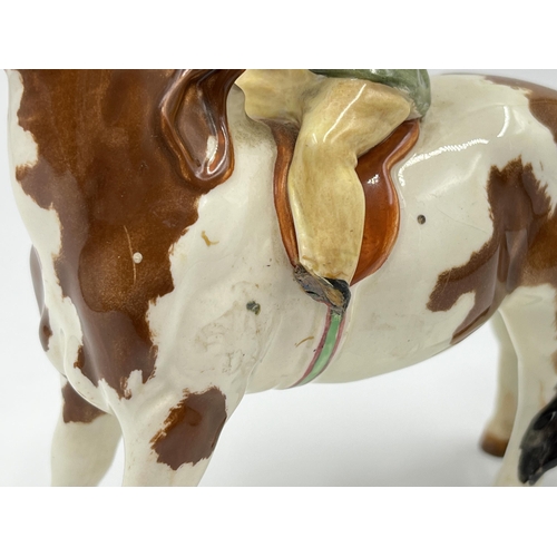 245 - A Beswick girl on pony figurine, model no. 1499 - approx. 14.5cm high