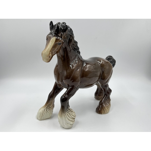 252 - A Beswick horse figurine - approx. 21cm high x 22cm wide