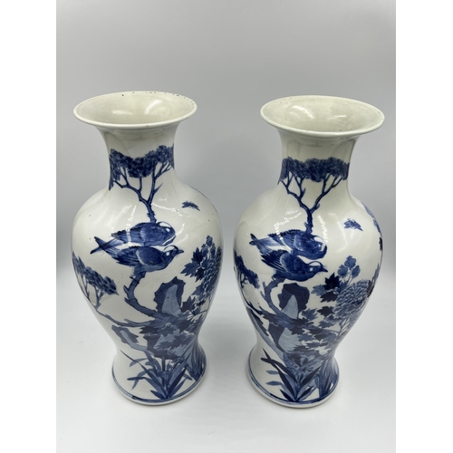 266 - A pair of Chinese blue and white porcelain baluster vases - approx. 35cm high