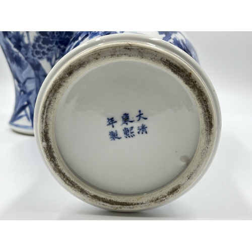 266 - A pair of Chinese blue and white porcelain baluster vases - approx. 35cm high