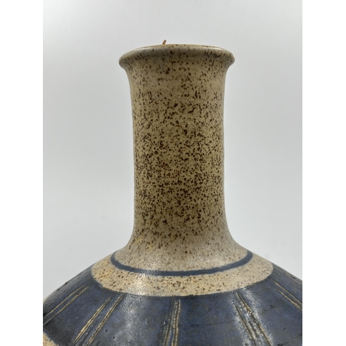 268 - A mid 20th century studio pottery bottle neck vase, signed J. C 333 - approx. 37cm high