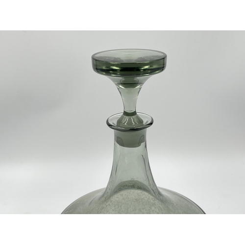 275 - A 1970s Frank Thrower for Dartington smoked glass decanter - approx. 23.5cm high x 17cm diameter