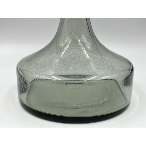 275 - A 1970s Frank Thrower for Dartington smoked glass decanter - approx. 23.5cm high x 17cm diameter