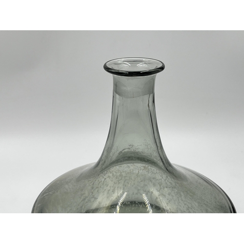 275 - A 1970s Frank Thrower for Dartington smoked glass decanter - approx. 23.5cm high x 17cm diameter