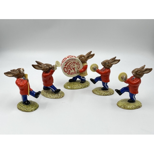 279 - A Royal Doulton five piece Oompah Band figurine collection comprising two Cymbals Bunnykins DB25, Tr... 