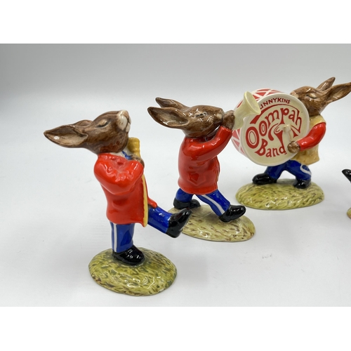 279 - A Royal Doulton five piece Oompah Band figurine collection comprising two Cymbals Bunnykins DB25, Tr... 