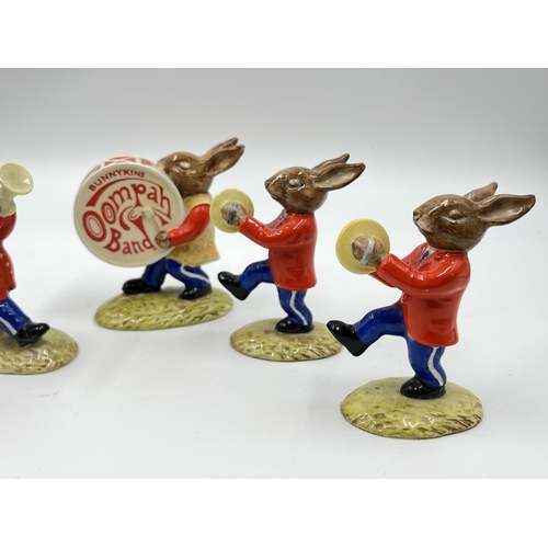 279 - A Royal Doulton five piece Oompah Band figurine collection comprising two Cymbals Bunnykins DB25, Tr... 