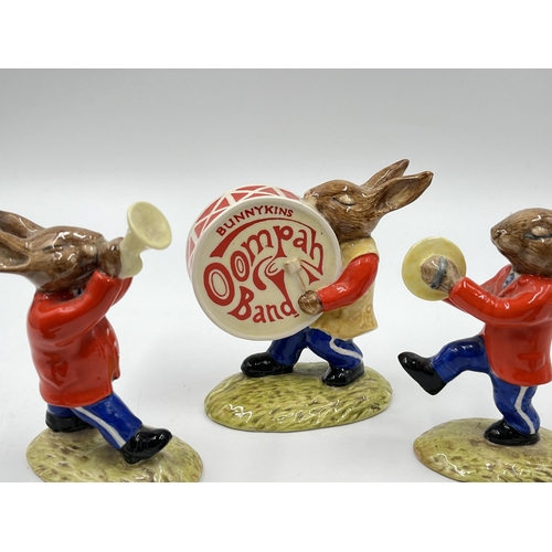 279 - A Royal Doulton five piece Oompah Band figurine collection comprising two Cymbals Bunnykins DB25, Tr... 