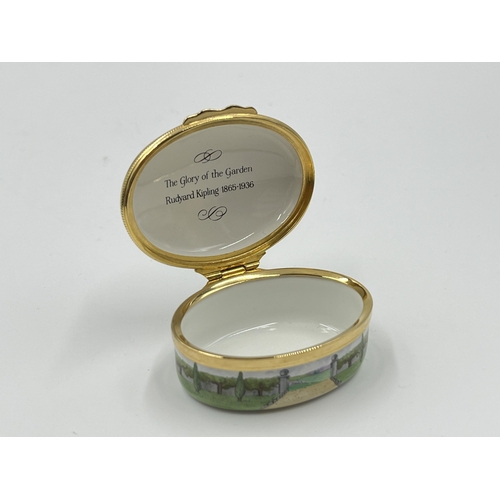 281 - A boxed Halcyon Days The Glory of the Garden enamel pill box - approx. 2.5cm high x 5.5cm wide x 4.5... 