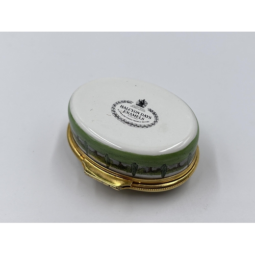 281 - A boxed Halcyon Days The Glory of the Garden enamel pill box - approx. 2.5cm high x 5.5cm wide x 4.5... 