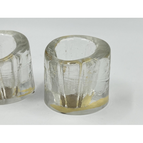 282 - A pair of mid 20th century Peter Tysoe studio glass candle holders - approx. 5cm high