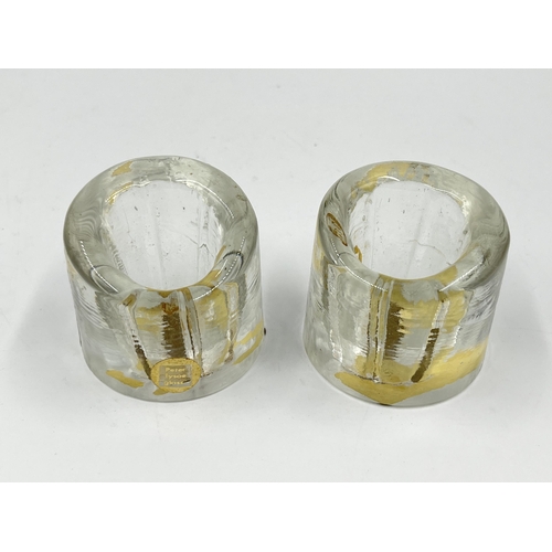 282 - A pair of mid 20th century Peter Tysoe studio glass candle holders - approx. 5cm high