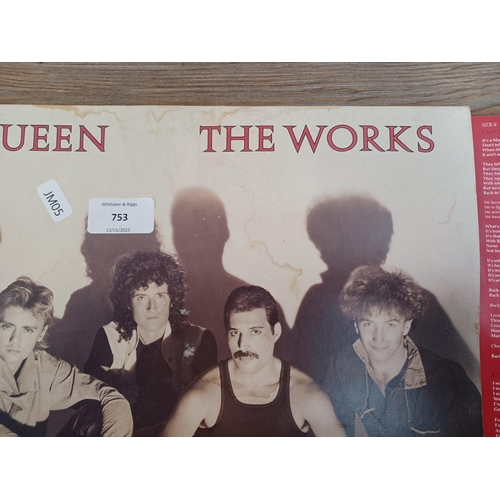 753 - Four rock LP vinyl records, The Cult 'Love' and 'Electric', Def Leppard 'Hysteria' and Queen 'The Wo... 