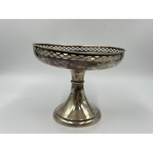 2251 - A white metal pedestal dish with pierced border - approx. 240 grams and measuring approx. 13.5cm hig... 