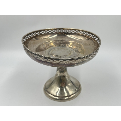 2251 - A white metal pedestal dish with pierced border - approx. 240 grams and measuring approx. 13.5cm hig... 