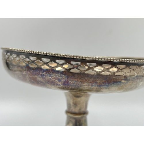 2251 - A white metal pedestal dish with pierced border - approx. 240 grams and measuring approx. 13.5cm hig... 