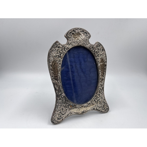 2255 - A Victorian hallmarked silver photograph frame - approx. 21cm high x 14cm wide