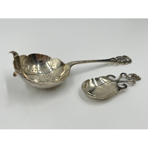 2259 - Two hallmarked sterling silver spoons, one Walker & Hall Sheffield silver sugar sifter dated 1935 an... 