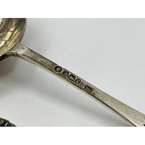 2259 - Two hallmarked sterling silver spoons, one Walker & Hall Sheffield silver sugar sifter dated 1935 an... 