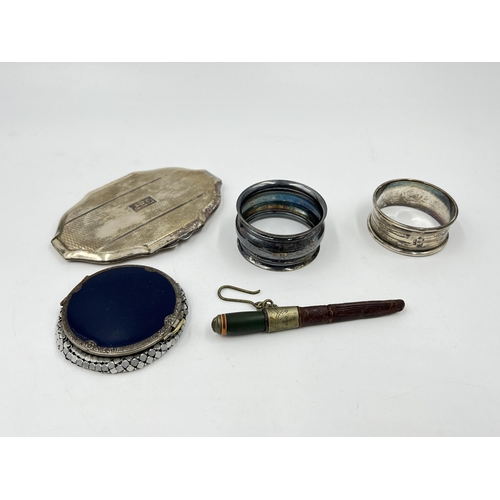 2260 - Five items to include hallmarked Birmingham silver napkin ring, two white metal compact mirrors etc.