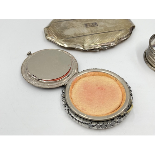 2260 - Five items to include hallmarked Birmingham silver napkin ring, two white metal compact mirrors etc.