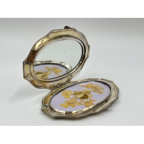 2260 - Five items to include hallmarked Birmingham silver napkin ring, two white metal compact mirrors etc.