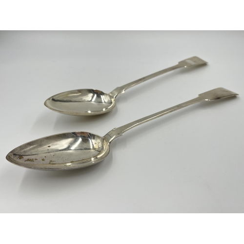 2267 - A pair of 19th century white metal serving spoons - approx. gross weight 240 grams and 33cm long