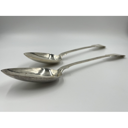 2267 - A pair of 19th century white metal serving spoons - approx. gross weight 240 grams and 33cm long