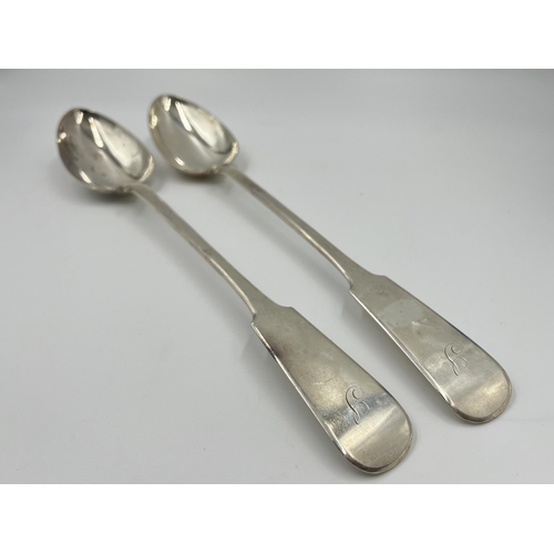 2267 - A pair of 19th century white metal serving spoons - approx. gross weight 240 grams and 33cm long