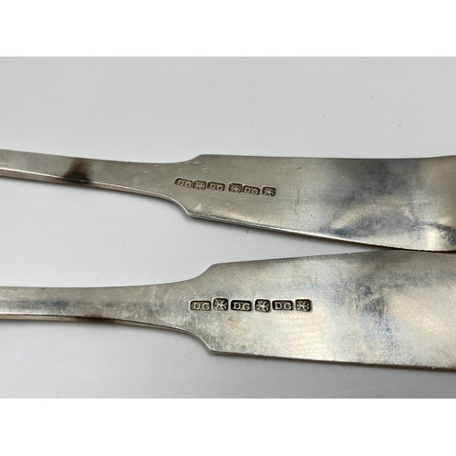 2267 - A pair of 19th century white metal serving spoons - approx. gross weight 240 grams and 33cm long