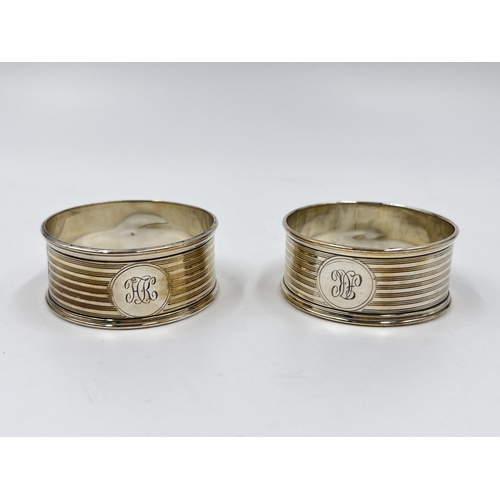 2272 - A pair of Adie Brothers Ltd hallmarked Birmingham silver napkin rings, one dated 1901 - approx. gros... 