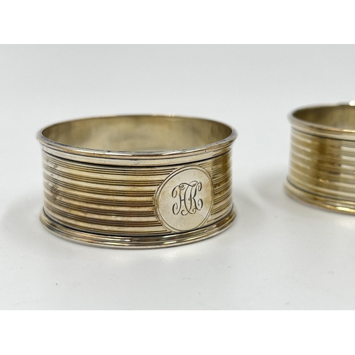 2272 - A pair of Adie Brothers Ltd hallmarked Birmingham silver napkin rings, one dated 1901 - approx. gros... 