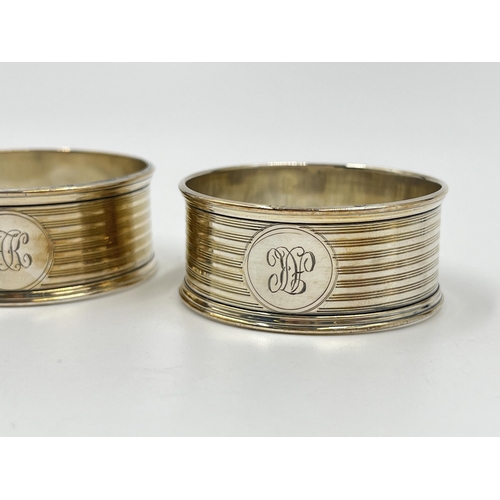 2272 - A pair of Adie Brothers Ltd hallmarked Birmingham silver napkin rings, one dated 1901 - approx. gros... 