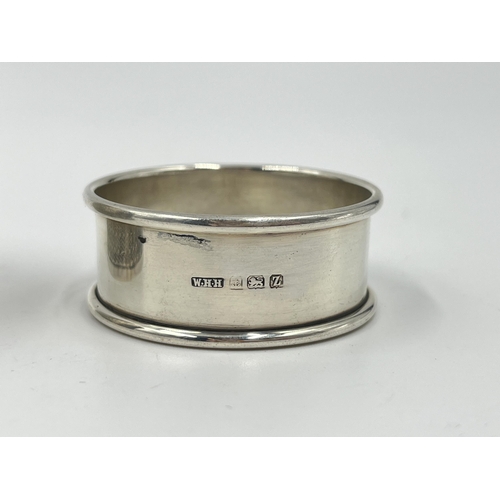 2277 - Three hallmarked Birmingham silver napkin rings - approx. gross weight 58 grams