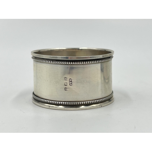 2277 - Three hallmarked Birmingham silver napkin rings - approx. gross weight 58 grams