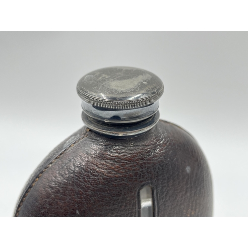 2279 - A late 19th century James Dixon & Sons leather and glass hip flask with EPBM cup - approx. 16cm high... 