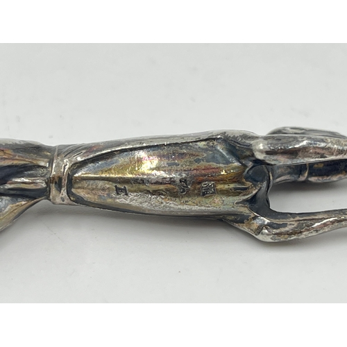 2280 - Six silver plated items to include WMF greyhound knife rests, WMF boy and frog dish etc. together wi... 