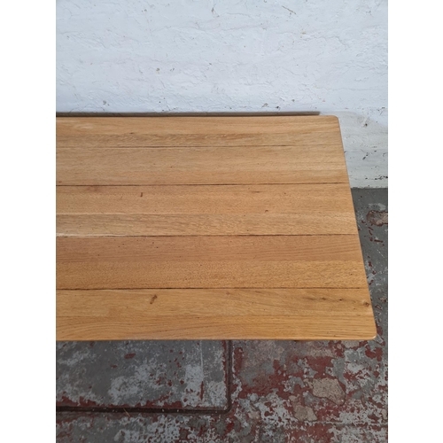 196 - A modern solid oak rectangular two tier coffee table - approx. 46cm high x 60cm wide x 120cm long